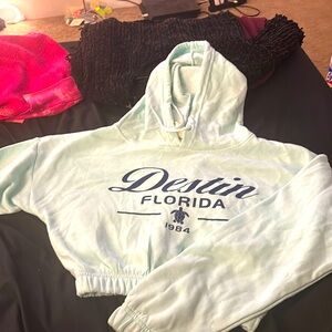 Teal cropped hoodie wore it a few times but in perfect shape.